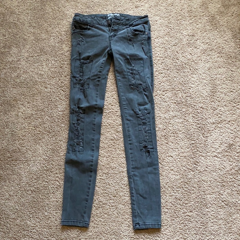 Royal Bones Distressed Skinny Jeans